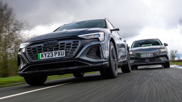 Audi Q8 e-tron and Genesis Electrified GV70 - front tracking